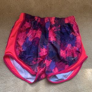 Pink Nike running shorts